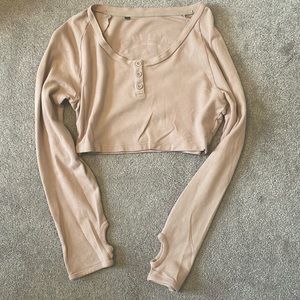 Gymshark cropped long sleeve shirt in a blush pink color